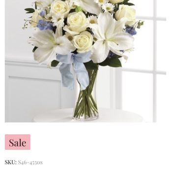 Nora's Flowers - what was advertised I spent $104 the next photo what sent how the daisies are missing no bow and much emptier. - Florists Near Me - Mira Loma, California Nora's Flowers - what was advertised I spent $104 the next photo what sent how the daisies are missing no bow and much emptier. - Florists Near Me - Mira Loma, California