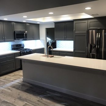 Metro Renovations - kitchen with a center island - General Contractors Near Me Metro Renovations - kitchen with a center island - General Contractors Near Me