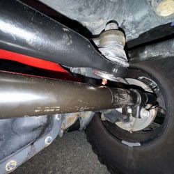 Mavis Discount Tire - Zerk fitting contacting tie rod. Causing damage to both components.