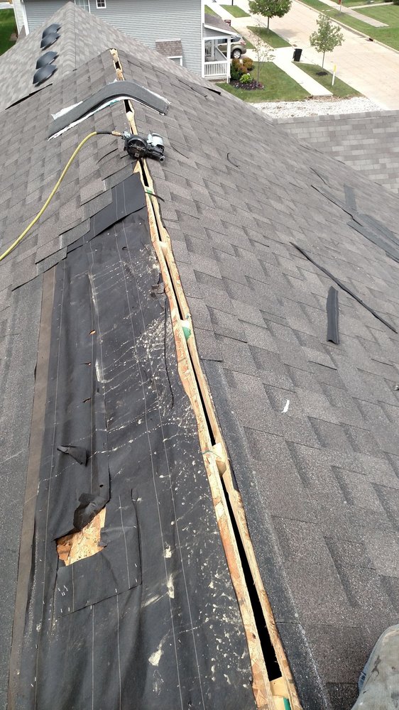 Slide of All Year Roofing