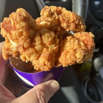 Taco Bell - Chicken strips. 4, spilling out of the cup. Lightly seasoned, pretty good. - Fast Food Near Me - Plain City, Ohio Taco Bell - Chicken strips. 4, spilling out of the cup. Lightly seasoned, pretty good. - Fast Food Near Me - Plain City, Ohio