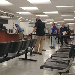 Check in line. Many people were masked and all were ibserving social distancing. Check in line. Many people were masked and all were ibserving social distancing.