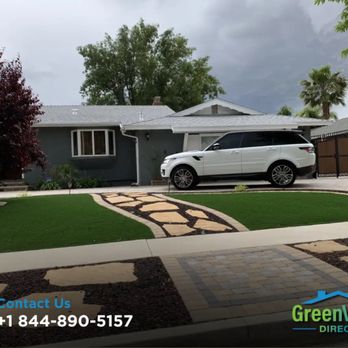 GreenView Direct - Front yard makeover with artificial turf, flagstone walkway, and decorative rock, clean curb appeal design by GreenView Direct. - Landscaping Near Me - Reseda, California