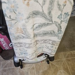 Kitchen rug, all clean and folded.  Will not put down until I wash the floor.