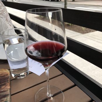 Verre Wine Bar - Pinot Noir on patio - Wine Bars Near Me - Arlington, Virginia Verre Wine Bar - Pinot Noir on patio - Wine Bars Near Me - Arlington, Virginia