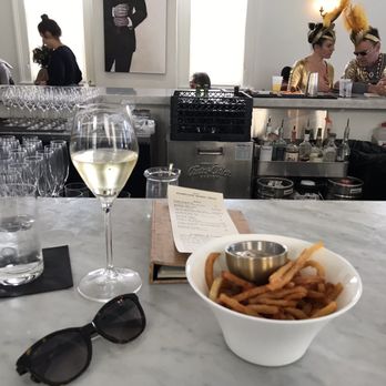 Effervescence - Pommes frites with tapenade aioli and a Prosecco! - Champagne Bars Near Me - New Orleans, Louisiana