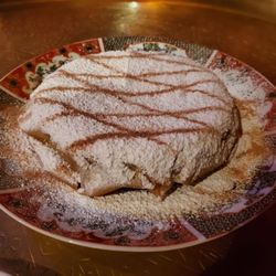 Casablanca Moroccan Restaurant - No idea what this is called. Phyllis dough filled with ground meat and covered with nutmeg and powdered sugar.