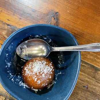Bibi’s Tiffin - Gulab jamun- omg a sweet donut saturated in  a sweet rose water glaze sprinkled with coconut - Indian Near Me - Bethlehem, Pennsylvania