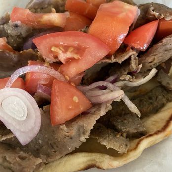 Greek Corner Cafe North County - Gyro sandwich- generous portion. Good deal for the money. Served the classics way with tomatoes and onion! Delicious - Greek Near Me - Carlsbad, California