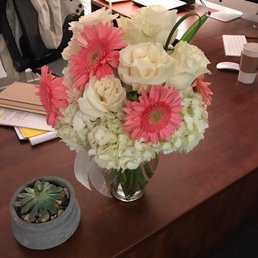 White roses w/ pink gerber daisies.