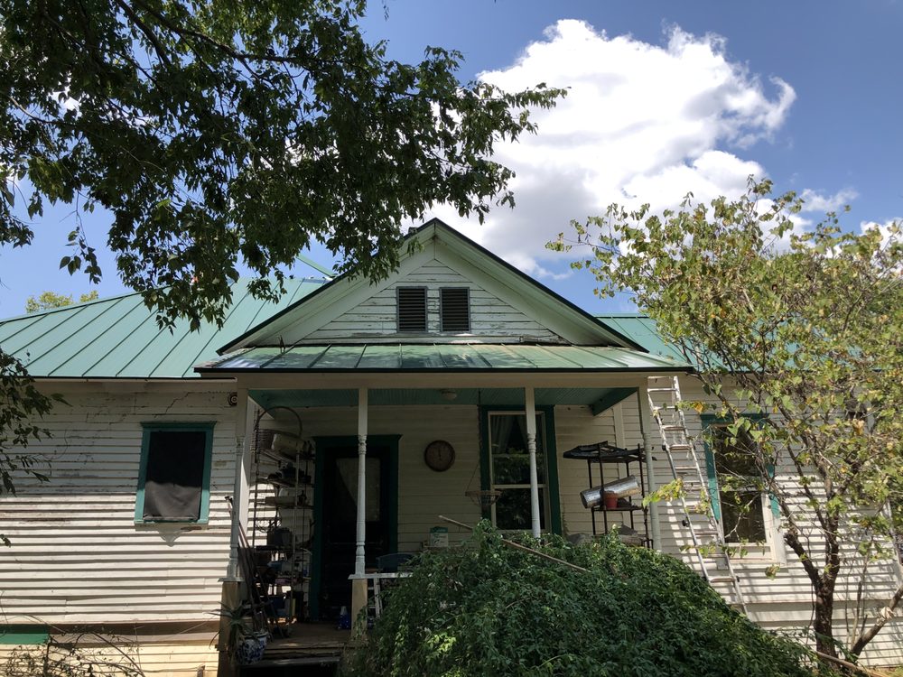 Slide of Revolutionary Roofing & Restoration