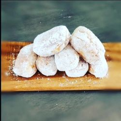 Caffeinated Rooster - Beignets- our take on a southern classic with a deep fried sweet dough tossed in powdered sugar.