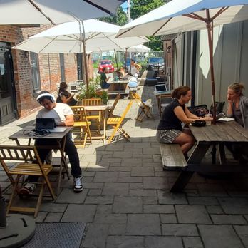 Kitchen & Coffee - Outdoor seating area, in the back of Kitchen & Coffee. - Coffee & Tea Near Me - Beacon, New York