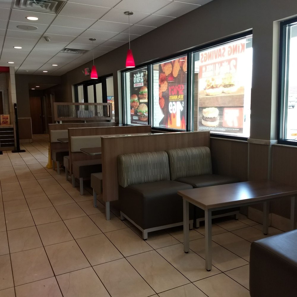 Interesting booth arrangement includes a coffee table size table. Could it possibly be for coffee?