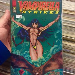 Game Room - "Dad, can I buy this comic book!"  "Umm, you should ask Mom."