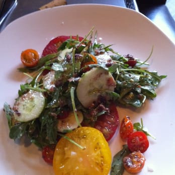 Revival Bar & Kitchen - Heirloom tomato salad with arugula, avocado, heirloom cucumbers and olive vinaigrette - New American Near Me - Berkeley, California