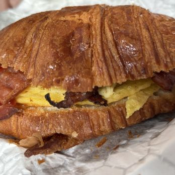 Bluestone Lane Times Square - Ham and Bacon, Egg & Cheese Croissant - Coffee & Tea Near Me - New York, New York Bluestone Lane Times Square - Ham and Bacon, Egg & Cheese Croissant - Coffee & Tea Near Me - New York, New York