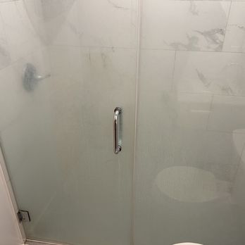 House Cleaning SF - Shower glass before cleaning - Home Cleaning Near Me