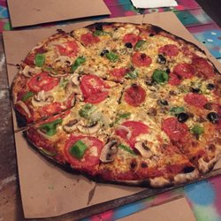 Petra Pizza a la Leña - Wooden pizza at Petra's
