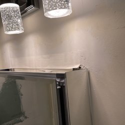 Bath Planet - Taped on medicine cabinet. I was too short to see this mess.