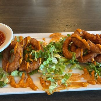 El Tito Modern Kitchen - Calamari is over flying - Sushi Bars Near Me - Sacramento, California