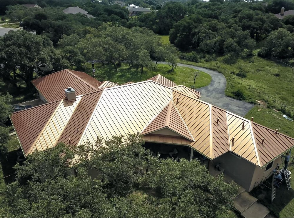 Slide of Tinsley Roofing