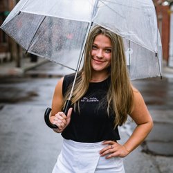 Anew Clothing - This pre-loved top is embroidered with the saying, "No rain, no flowers."