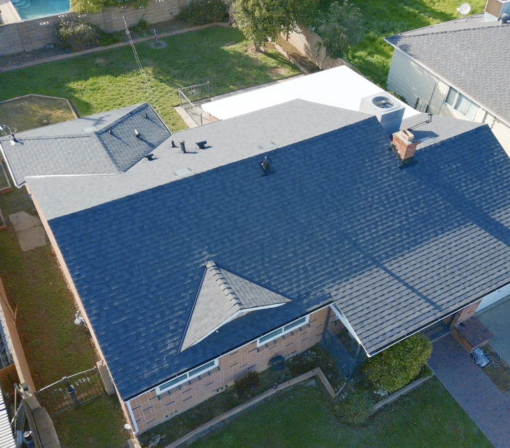 Slide of VIK Quality Roofing