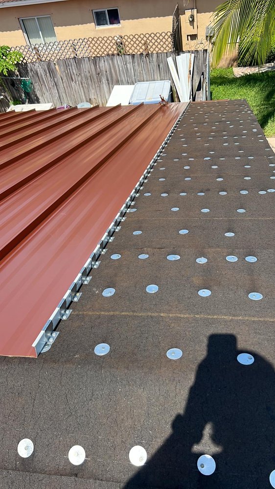 Slide of Empire Roofing