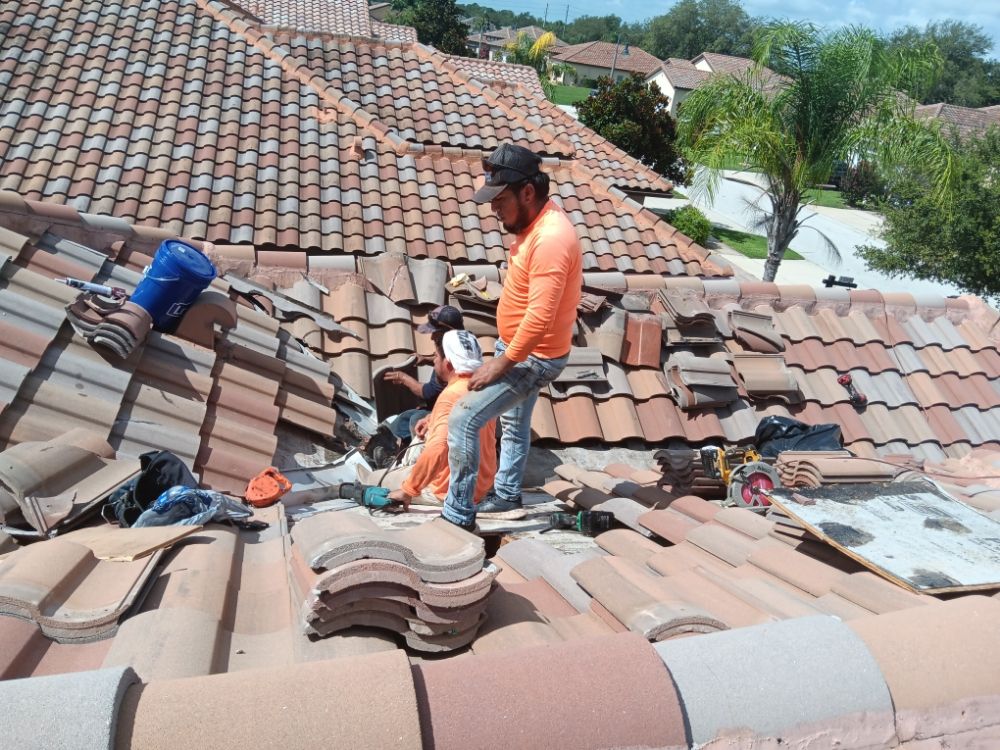 Slide of The Roofing Guys