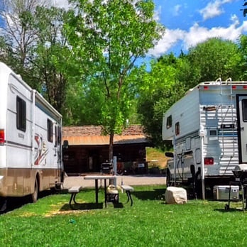 Pine Near RV Park - We're enjoying shade on a beautiful day. Note that our RV on the left is on a smaller than normal site. - Campgrounds Near Me - Winthrop, Washington