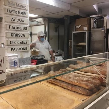 Bricco Panetteria - Yep the loaf right in front is the one we got. So delicious. - Bakeries Near Me - Boston, Massachusetts