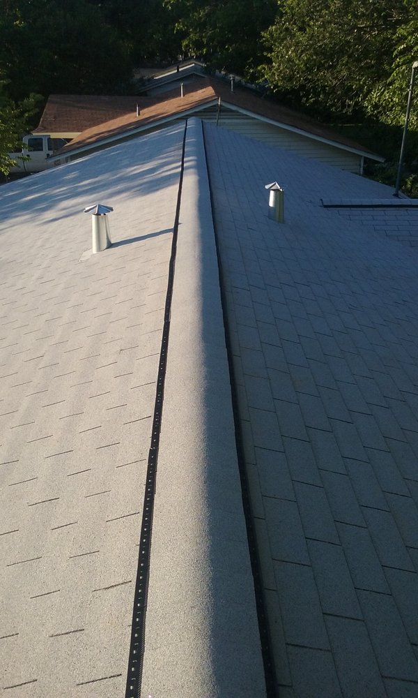 Slide of Humberto's Roofing Service