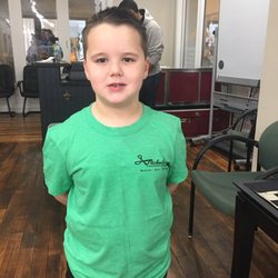 Michaelangelo's Barbershop and Nails  - A loyal client of the barbershop Stan here loves his hair spiked .
