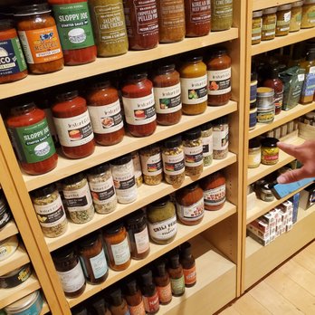 Williams-Sonoma - a man looking at a shelf full of sauces - Kitchen & Bath Near Me - Tampa, Florida Williams-Sonoma - a man looking at a shelf full of sauces - Kitchen & Bath Near Me - Tampa, Florida