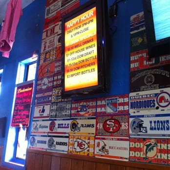 Sand Bar - Drink specials in the forefront. Food specials in the backdrop. - Sports Bars Near Me - Marco Island, Florida Sand Bar - Drink specials in the forefront. Food specials in the backdrop. - Sports Bars Near Me - Marco Island, Florida