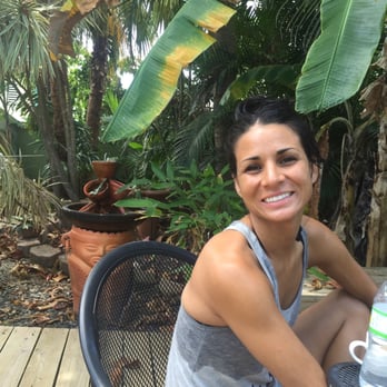 Palmetto Guesthouse - My BFF in the backyard garden where we enjoyed our coffee. - Bed & Breakfast Near Me