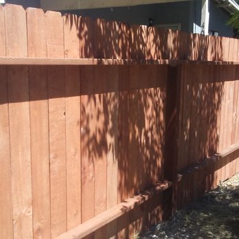 Custom Service Center - A view of the back side of a fence I built, showing how level and solid the design is. - Handyman Near Me Custom Service Center - A view of the back side of a fence I built, showing how level and solid the design is. - Handyman Near Me