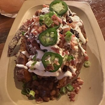 Sauced BBQ & Spirits - Orange - Loaded Jumbo Sweet Potater - Barbeque Near Me - Orange, California Sauced BBQ & Spirits - Orange - Loaded Jumbo Sweet Potater - Barbeque Near Me - Orange, California