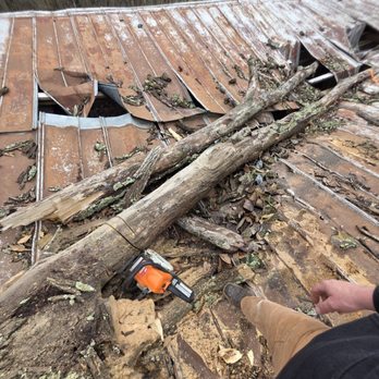 Tit For Tat Construction - Removing a tree that fell on a barn roof. - General Contractors Near Me - Batavia, Ohio Tit For Tat Construction - Removing a tree that fell on a barn roof. - General Contractors Near Me - Batavia, Ohio