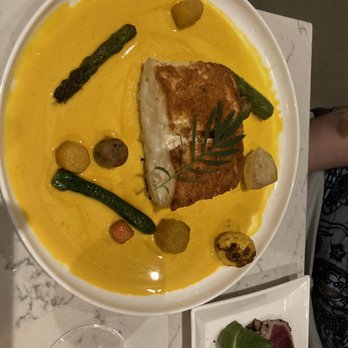 ARLO - The halibut . Looks gorgeous but was dry AF from sitting under a heat lamp. - New American Near Me - San Diego, California