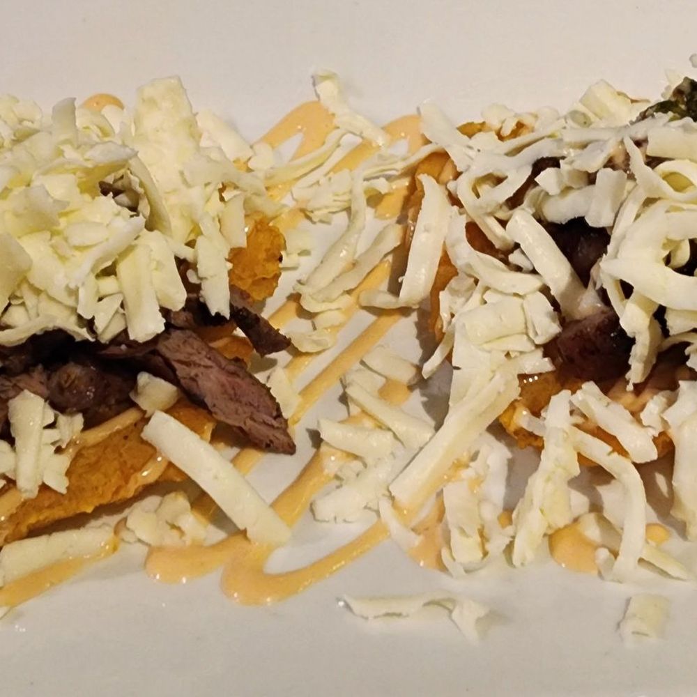 Parrillada Familiar Da Silva - two tacos on a plate - Steakhouses Near Me - Doral, Florida Parrillada Familiar Da Silva - two tacos on a plate - Steakhouses Near Me - Doral, Florida