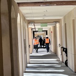 Grand Pacific Palisades - Workers wearing protective helmets, but walking under construction guests and kids are not.