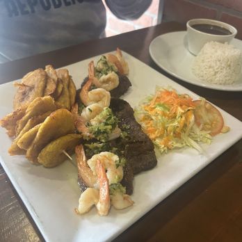 Caribe Restaurant - The food was AMAZING.  I ordered fried green plantains with skirt steak and shrimps (tostones con churrasco y camarones) ! - Spanish Near Me - Bronx, New York