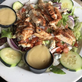 Northern Trails Bar & Grill - Blackened chicken salad with blue cheese instead of shredded cheddar. I had it with honey white balsamic. - American Near Me - Newaygo, Michigan