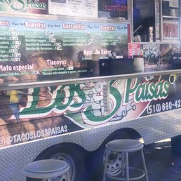 Menu listed on side of food trailer Menu listed on side of food trailer