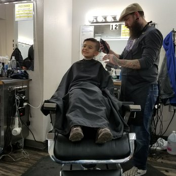 The Kingdom Barbershop - Chris working his magic on my sons hair - Barbers Near Me - Kent, Washington The Kingdom Barbershop - Chris working his magic on my sons hair - Barbers Near Me - Kent, Washington