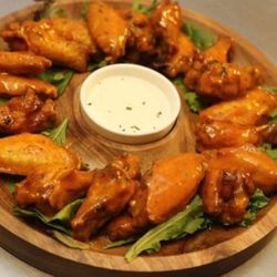 Half Time Sports Bar & Grill - Every Thursday Night is $0.60 Wing Night during Happy Hour from 6-9 w/ $2.99 Drinks
