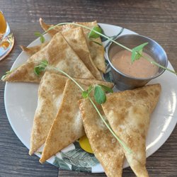 Prosciutto and dill pickle won tons