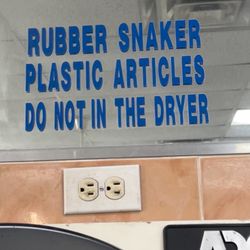 86 Street Superwash Center - Rubber snaker. Do not in the dryer.